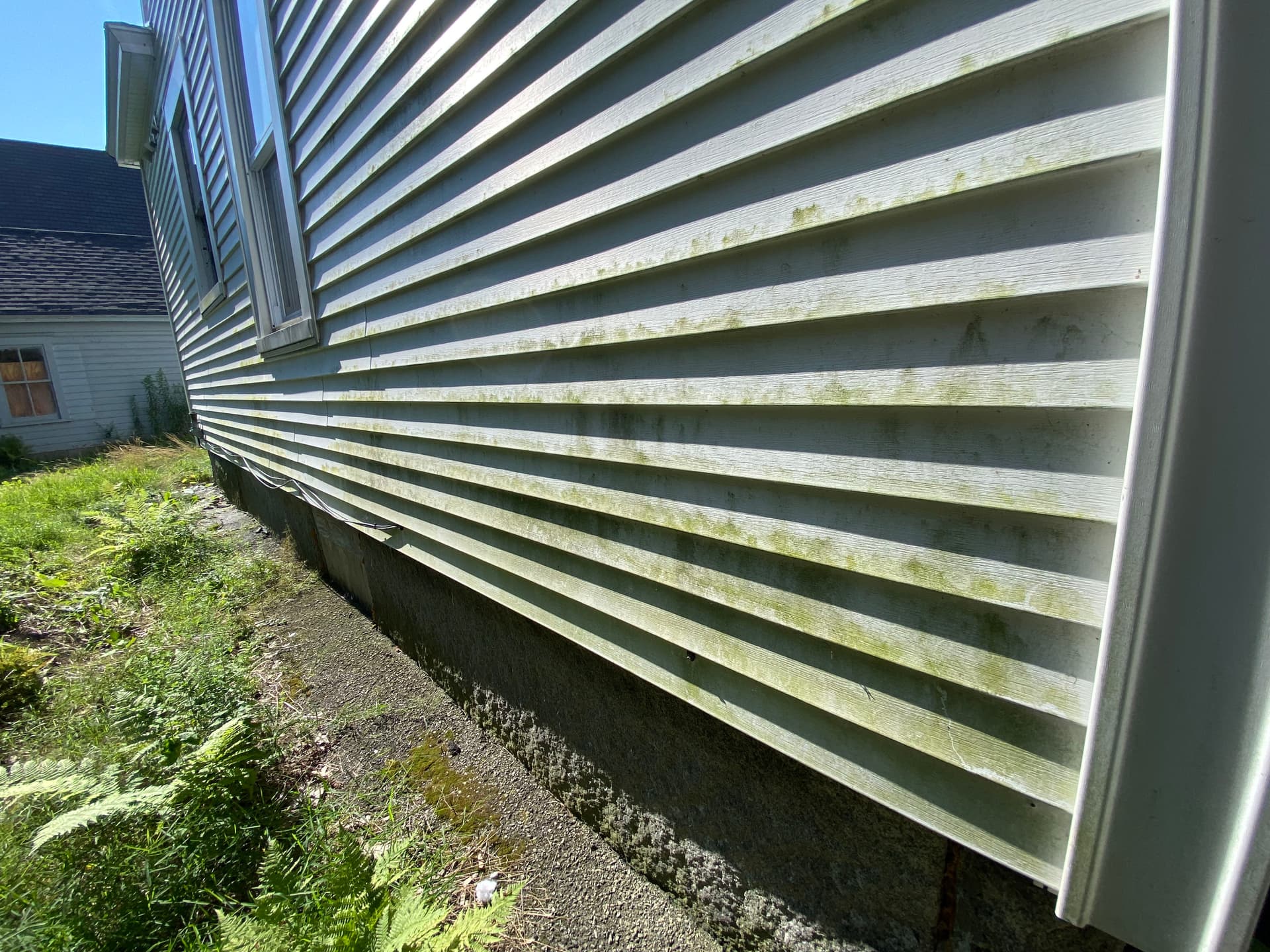 House Washing Before and After Results in Colchester VT image